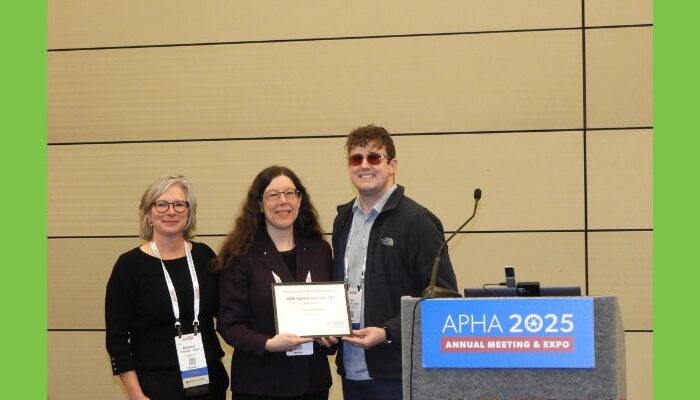 OHSU-PSU School of Public Health Professor Willi Horner-Johnson receiving the Margaret “Peg” Nosek Award from the APHA Disability Section
