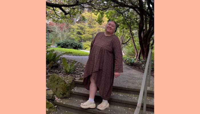 Alessandra Weiss, SPH MPH Public Health Practice student standing in a public garden