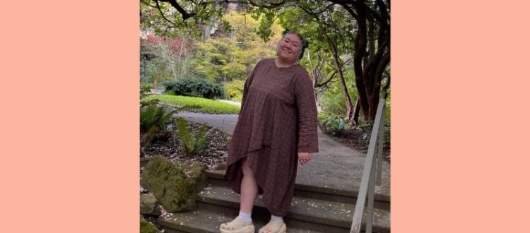 Alessandra Weiss, SPH MPH Public Health Practice student standing in a public garden