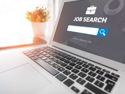 Laptop open with a the OHSU-PSU School of Public Health Job Board page on the web browser